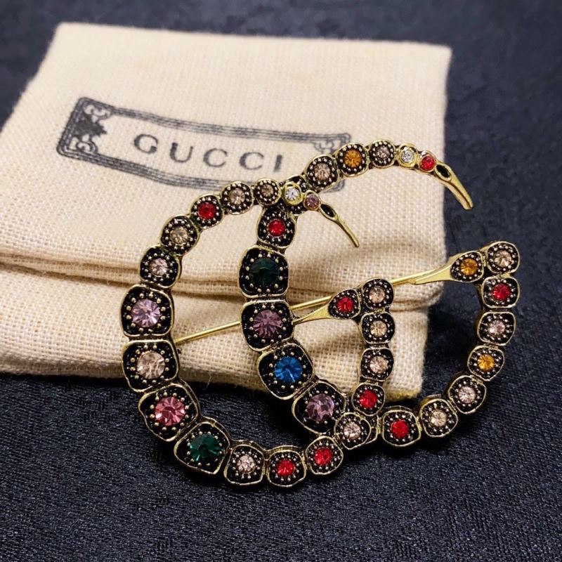 Gvc*1 brooches